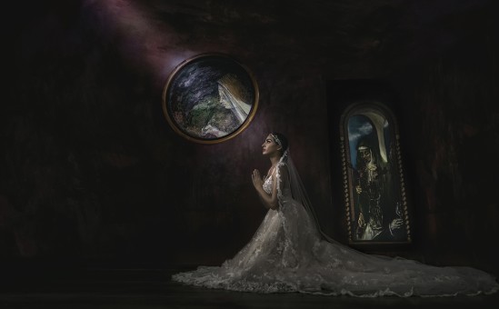 Kneeling bride in Martorell Room at El Convento Hotel Old San Juan Puerto Rico