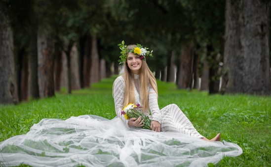 Beautiful bride in the grass at Rome, Italy
