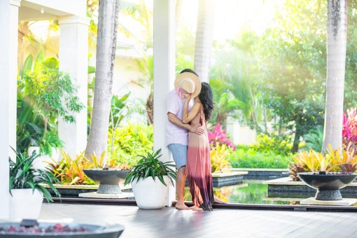 Couple kissing at St. Regis Bahia Beach Resort Puerto Rico