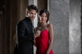 Couple toast in St. Marks Square in Venice