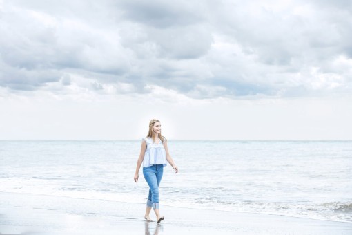 Girl walking on the beach