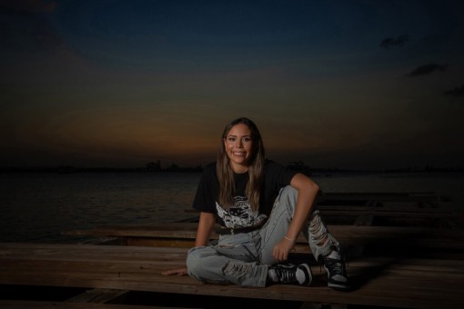 Quinceanera during sunset at Old San Juan Gate